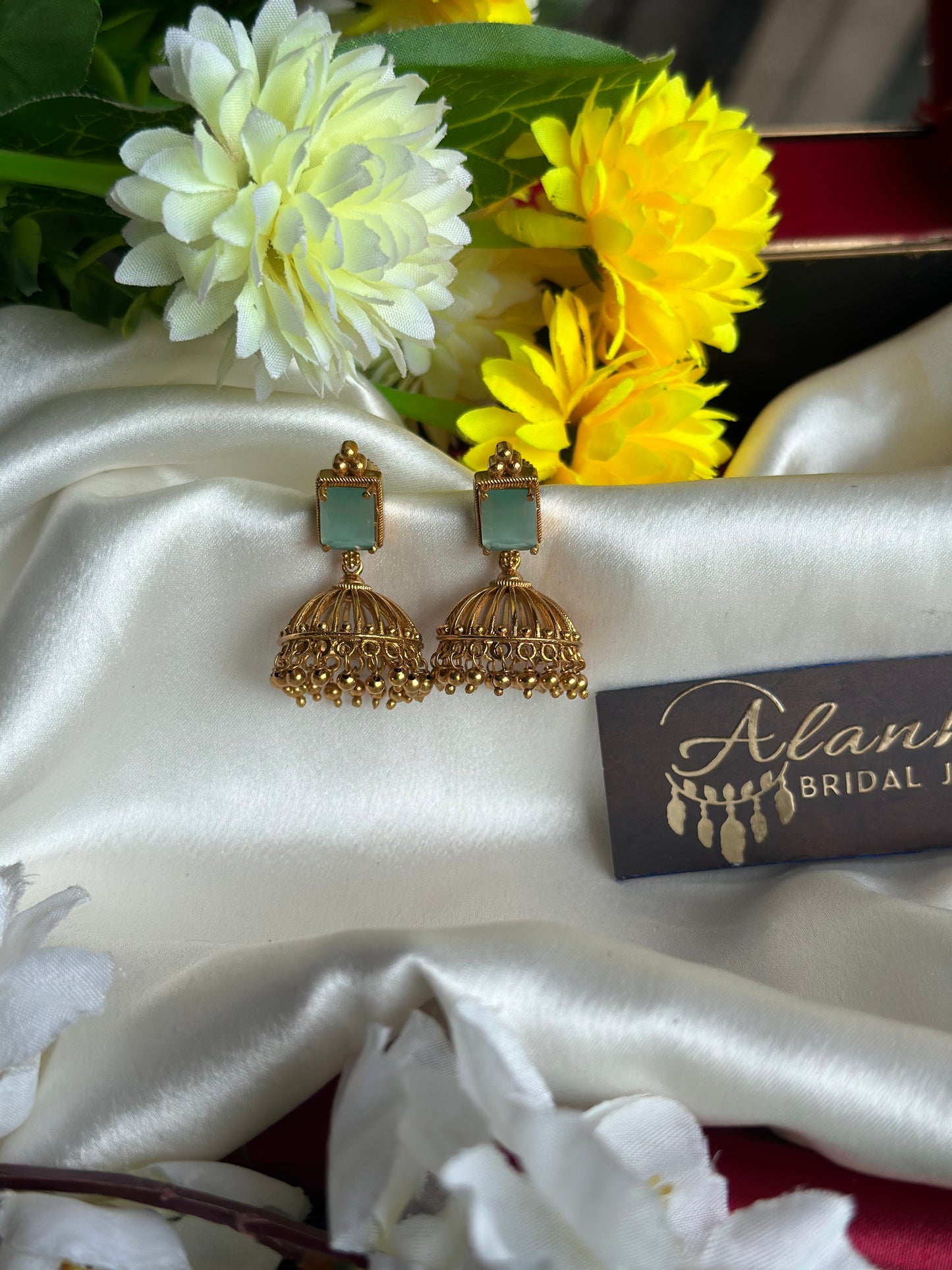 Antique Gold Jhumka with AD Stones