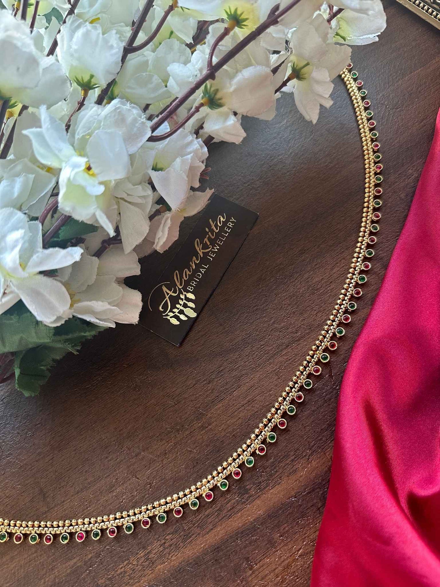 Simple Gold Look Alike Thin Hip Chain with Green & Ruby Stones